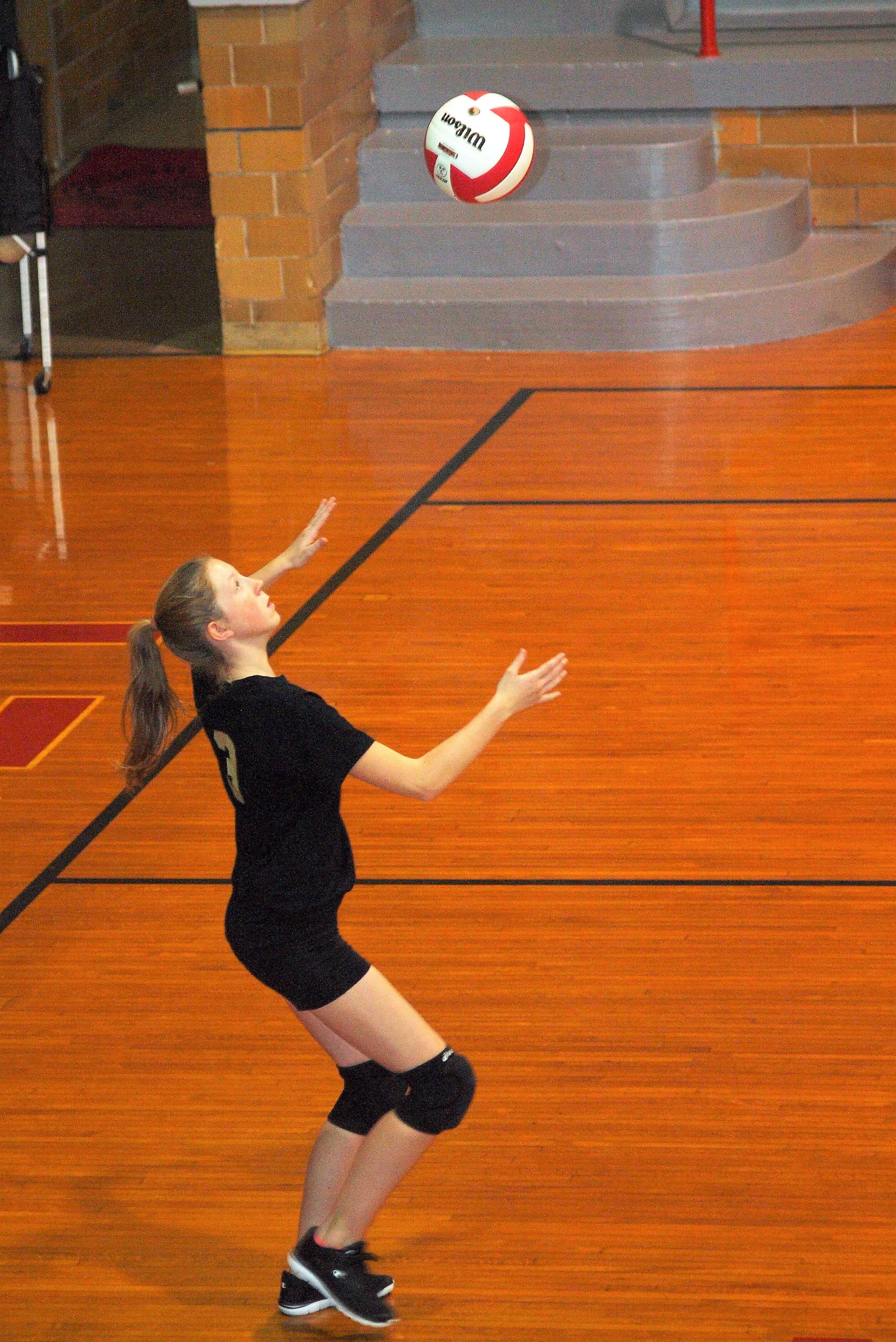 Abby playing Volleyball